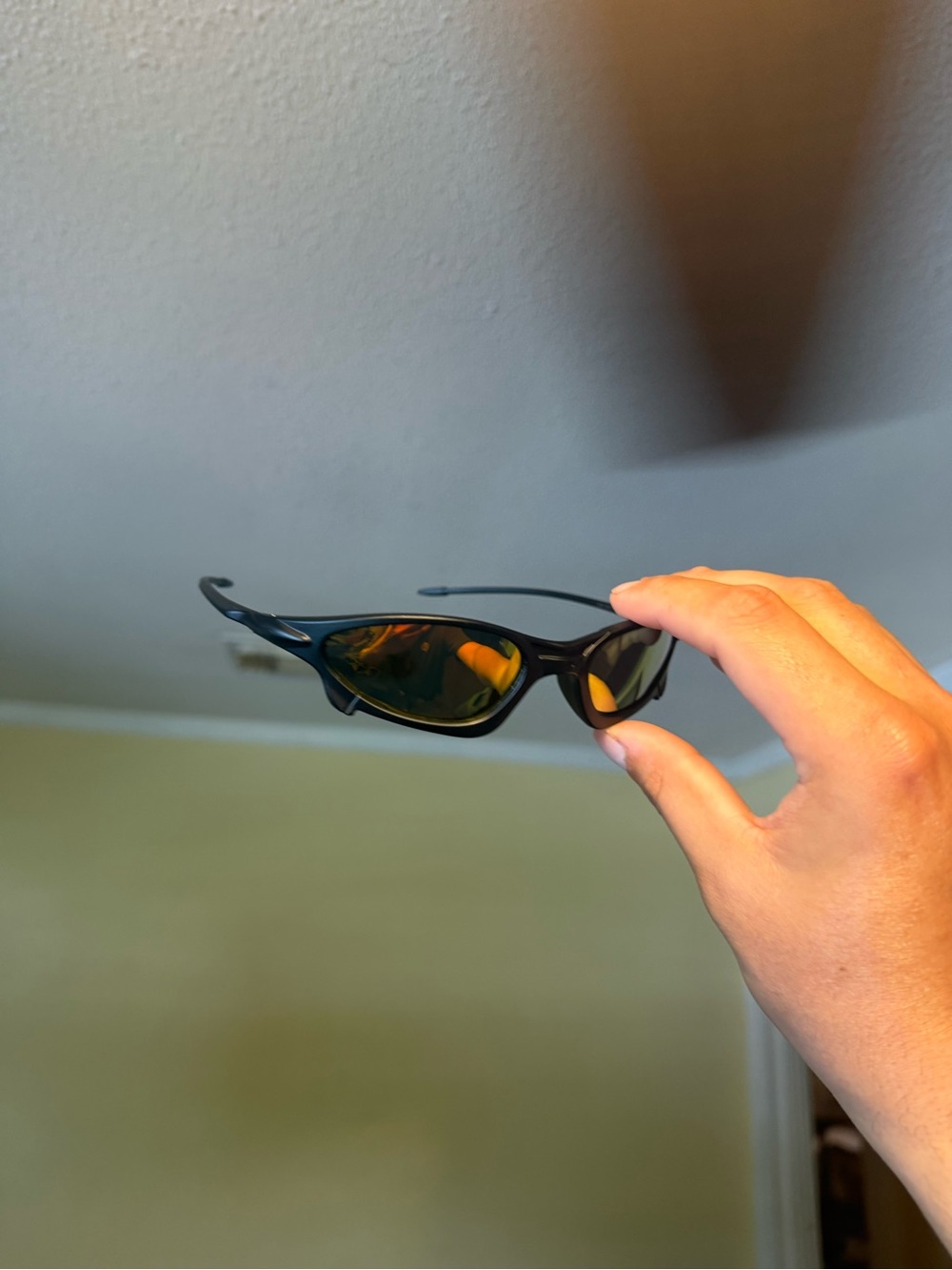 Sleek Black Sport Sunglasses with Amber Lenses Oakley Oakleys